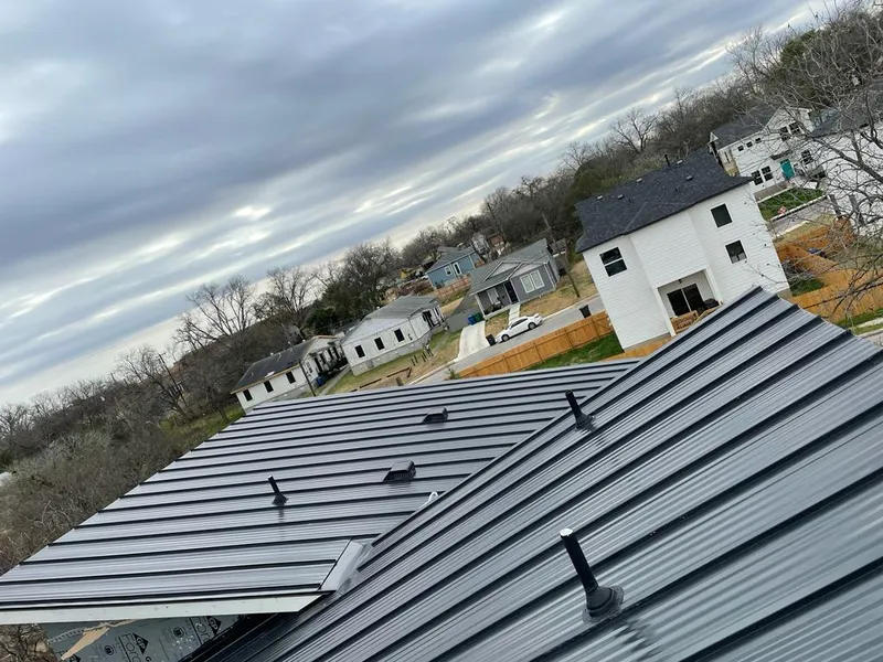 Standing seam metal roof panels with vents for Skylight Repair in Lake Mills